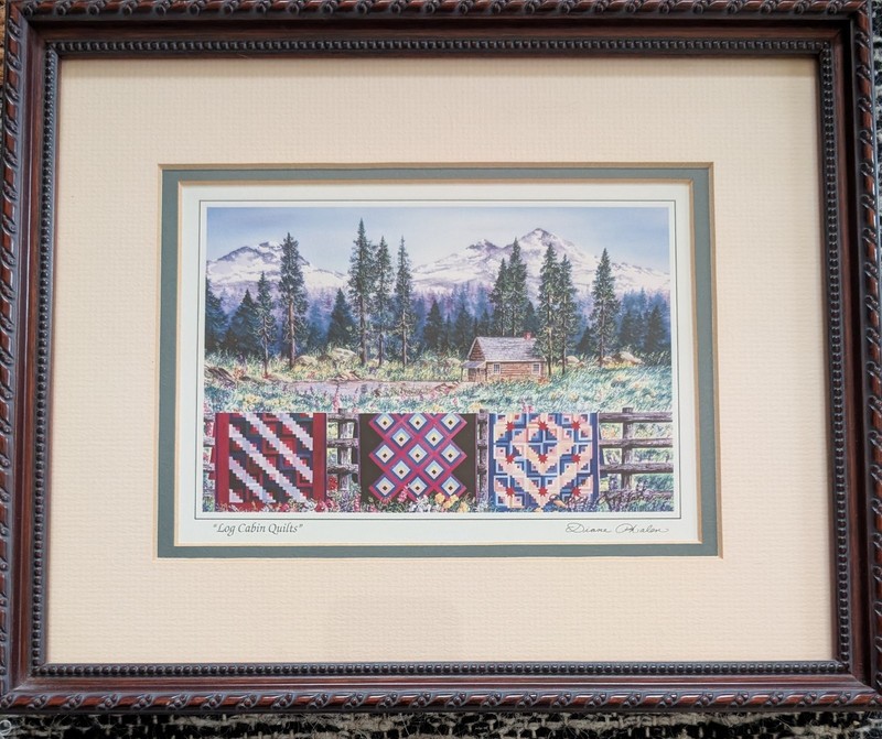 Framed print titled «Log Cabin Quilts» by artist Diane Phalen.