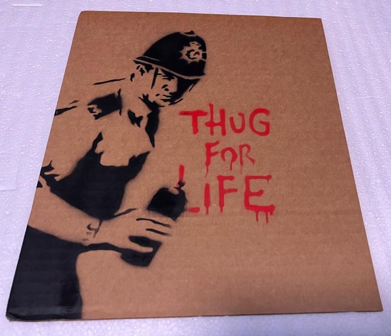 Bankys Dismaland- Thug For Life, Cardboard Signed, Original print