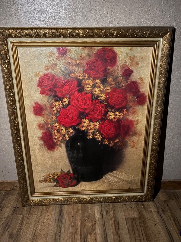 Beautiful oversized floral wall art in an ornate gold frame. Rich red roses with