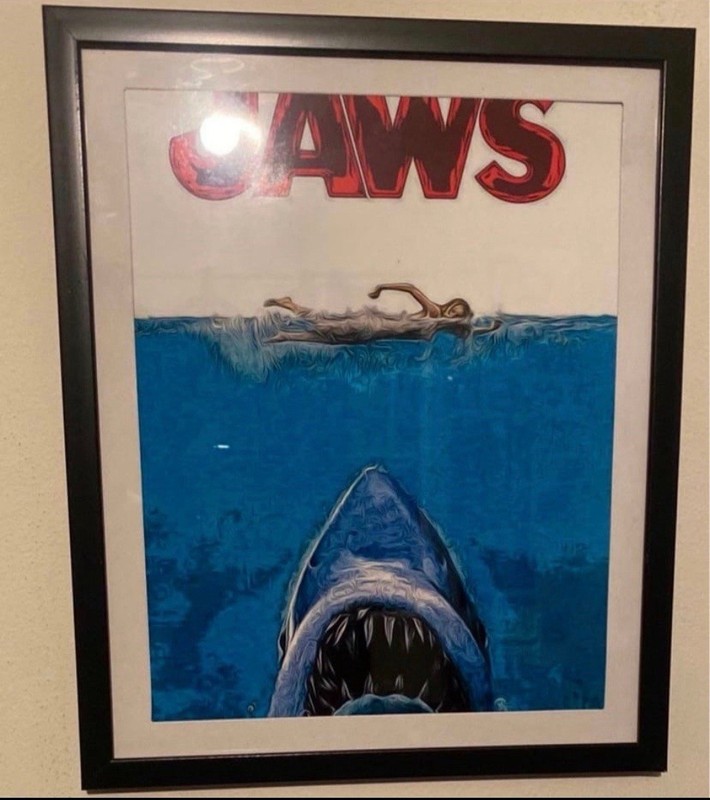 Jaws art piece on black frame