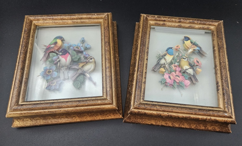 Vintage 3D paper tole shadow boxes of birds and flowers.